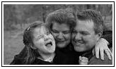photo closeup of a girl with mother and father